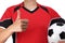 Woman dressed in soccer doing okay sign