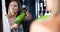 Woman dries hair and styles hair in bathroom the mirror