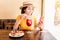 Woman drink sangria and eating tapas in spanish cafe