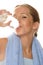 Woman drinking bottled water