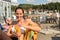 Woman drinking cocktail at beach bar