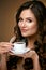Woman Drinking Coffee. Female Drinking Hot Beverage.