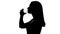 Woman drinking glass of water, restoring balance, silhouette, nutrition