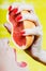 Woman drinking grapefruit juice