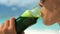 Woman Drinking Green Vegetable Smoothie On Beach - Healthy Diet Detox Juice