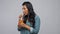 Woman drinking juice from plastic cup with straw