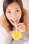 Woman drinking orange juice