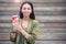 Woman drinking tasty coffee outdoors in the park