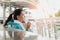 Woman drinking water during break in the morning to protect dehydrate and heat strokes