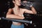 Woman drinking water recovery health exercise workout in gym fitness breaking relax after training sport with kettlebell,