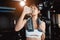 Woman drinking water recovery health exercise workout in gym fitness breaking relax after training sport with kettlebell,