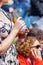 Woman drinks at a street festival