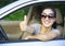 Woman driver thumb up