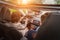 Woman driving a car in a sunny day