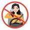 Woman driving a car talking on the phone. sign stop danger