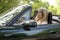 Woman Driving in Convertible