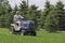 Woman Driving Lawn Mower