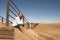 Woman on dry farm land in outback Australia