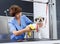 Woman drying havanese with towel