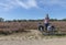 Woman with e bike on the dutch heather fields