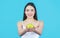 Woman eat green apple. Portrait of young beautiful happy smiling woman with green apples. Healthy diet food. Woman with