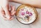 Woman eating cereal with milk, close-up