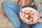 Woman eating delicious oatmeal with fruits at home