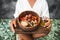 Woman eating falafel balls, hummus and fresh salad