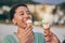 Woman, eating ice cream and beach with smile, thinking and memory for sweets, treat and cone on summer vacation. African