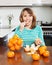 Woman eating mandarin