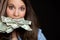 Woman Eating Money