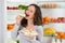 Woman Eating Slice Of Cake