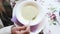 Woman eating soup in restaurant