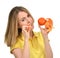 Woman eating tangerine mandarin fruit