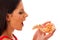 Woman eating tasty piece of pizza. Unhealthy fast food meal.