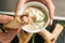 Woman eating tasty salmon in phyllo dough, closeup