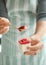 Woman eating tasty strawberry panna cotta, closeup