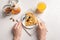 Woman eating thin pancakes with berries