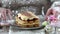 Woman is eating a traditional italian tiramisu cake.