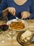 Woman eating traditional spaghetti bolognese