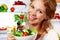 woman eats healthy food vegetable vegetarian salad about refrigerator