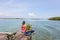 Woman at the edge of pier