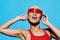 Woman emotion blue smiling beauty swimsuit asian red fashionable fashion sunglasses portrait