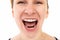 a woman emotionally screams with her mouth wide open, profile picture on a white background