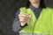 woman engineer in a white helmet and safety vest, the engineer on the construction site