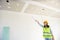 Woman engineers working in side building planning for the ceiling