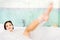 Woman enjoy bath foam in the bathtub