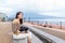 Woman enjoy foot onsen with cat at outdoor