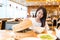 Woman enjoy meal in chinese restaurant