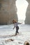 Woman enjoy surf of Atlantic Ocean foamy wavy waters laughing spend vacation on the beach in Lagos